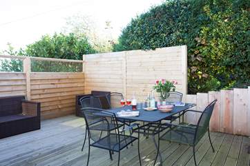 Dine al fresco while admiring the beautiful surroundings.