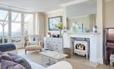 The spacious second sitting-room with wood-burner and piano.  - Thumbnail Image