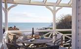 Walk out onto the balcony from the ground floor to breathtaking views across Seagrove Bay. - Thumbnail Image