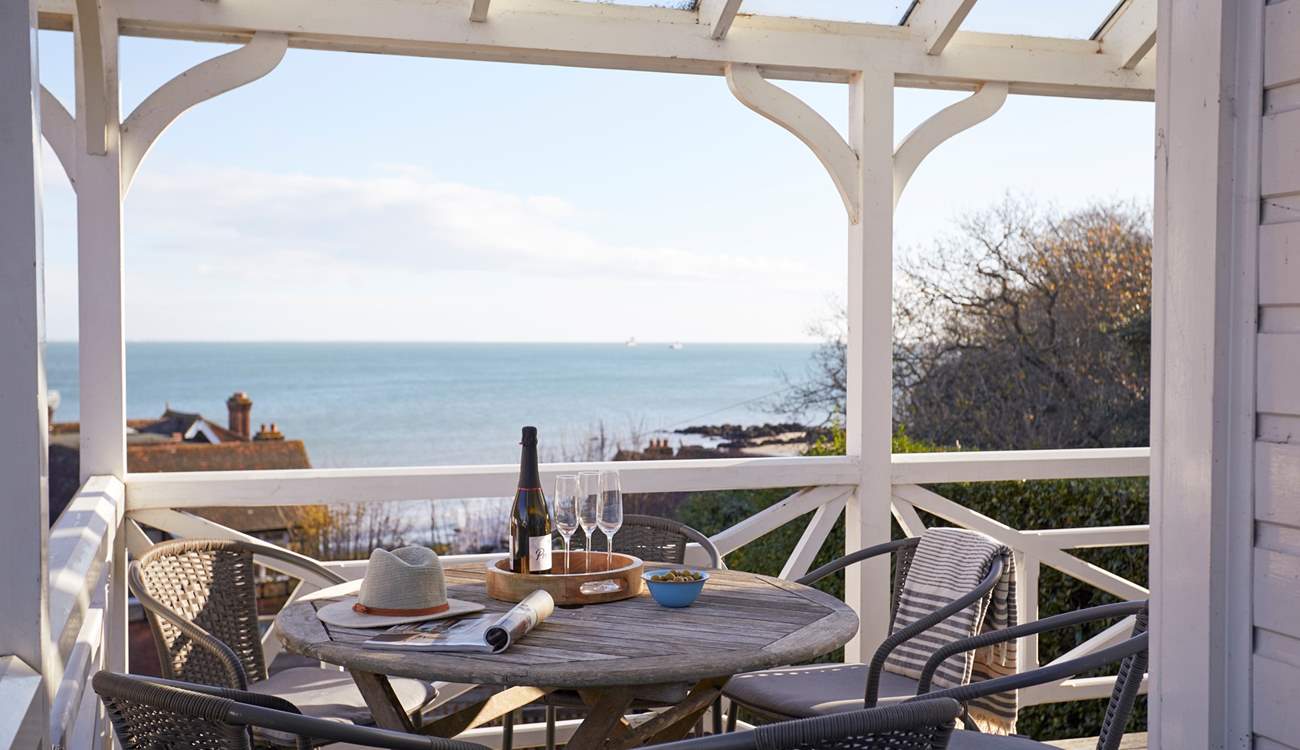 Walk out onto the balcony from the ground floor to breathtaking views across Seagrove Bay.