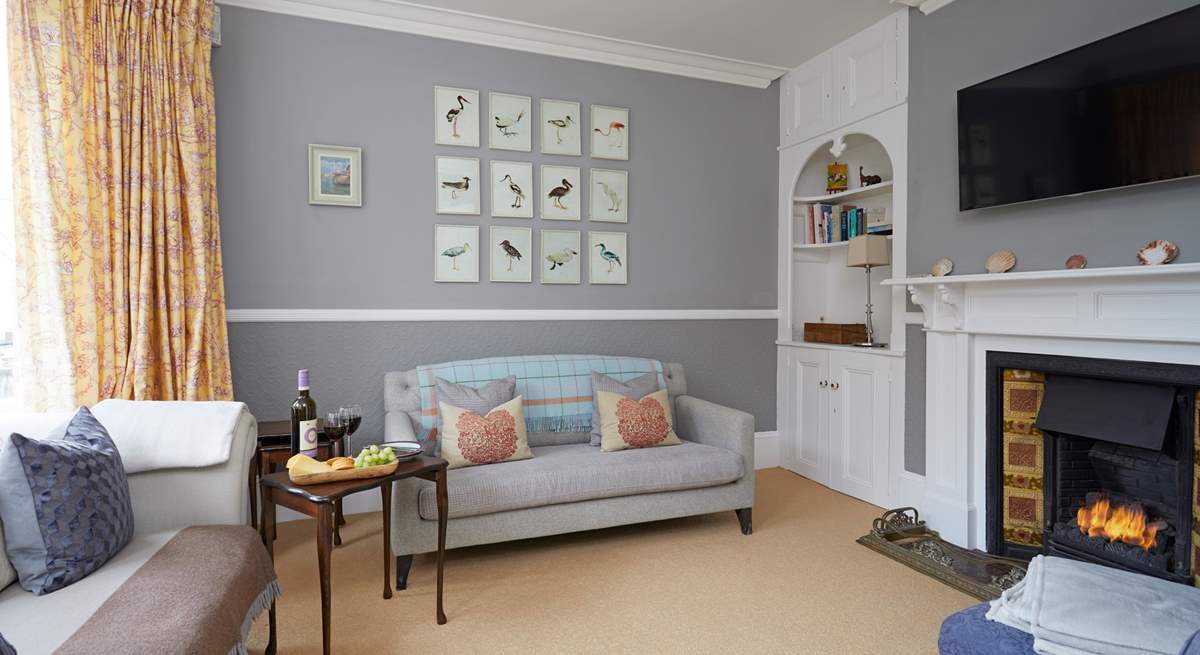 The sitting-room with coal-effect gas fire.