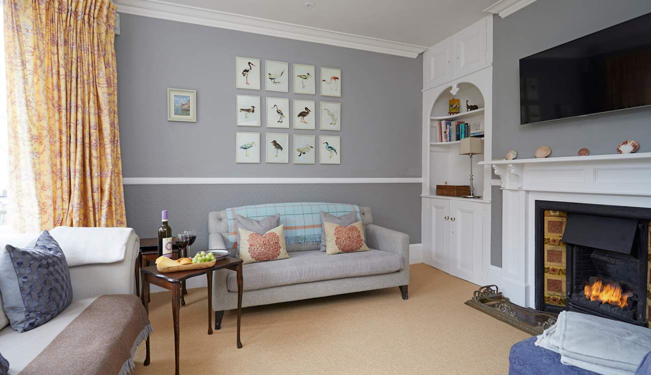 The sitting-room with coal-effect gas fire.