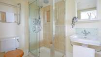 The lower ground floor family shower-room. 