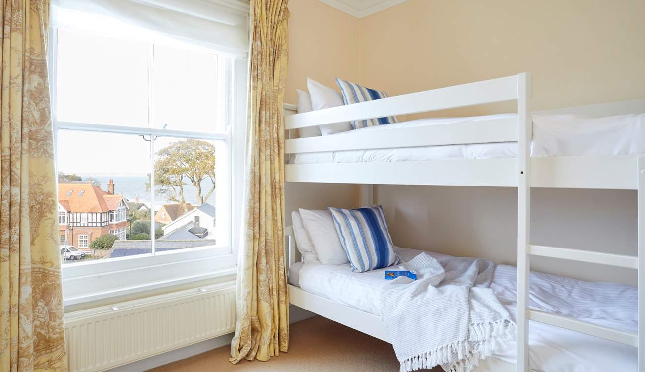 Located on the first floor this room has two sets of bunk-beds.