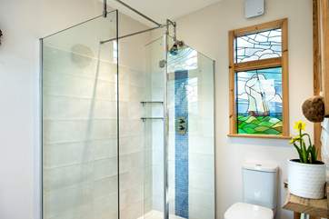Of course there is a super stylish en suite shower-room with a large shower, a WC...