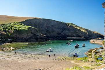 Watch the comings and goings in the harbour.