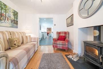 The second sitting-room is perfect to relax and chat with your loved ones (the wood-burner is not for guests' use).