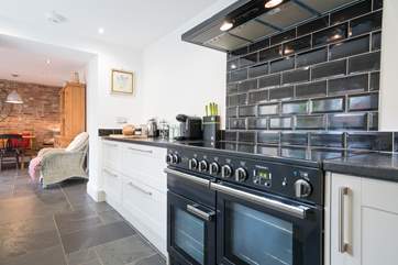 Enjoying cooking in this stylish modern kitchen.