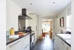 Enjoying cooking in this stylish modern kitchen. 