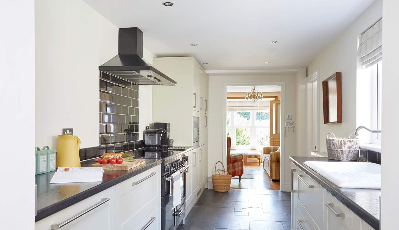 Enjoying cooking in this stylish modern kitchen. 