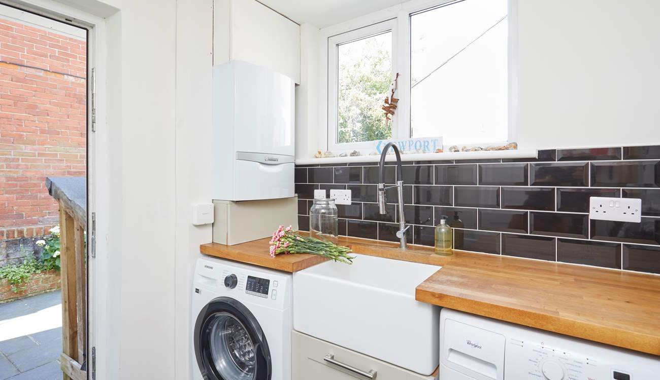 The utility-area is also a great place to hang outside coats and store your shoes after a day of adventuring.