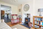 The second sitting-room is perfect to relax and chat with your loved ones (please note, the wood-burner is not for guests' use).