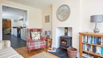 The second sitting-room is perfect to relax and chat with your loved ones (please note, the wood-burner is not for guests' use).