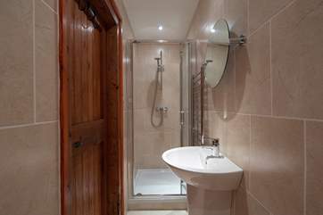 Bedroom 1 has an en suite shower-room.