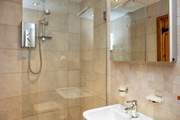 The shower-room is situated on the lower ground floor.