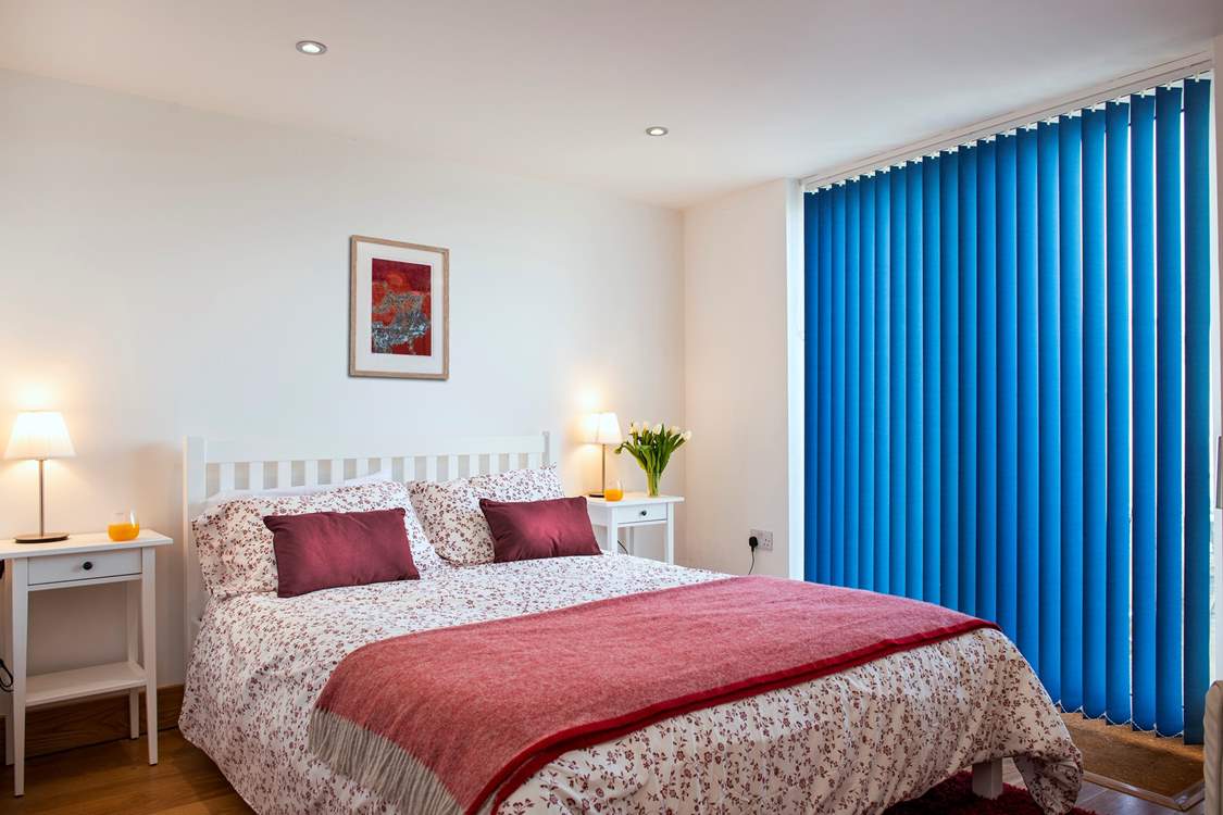 Bedroom 1 on the lower ground floor has a super-comfy king-size bed.