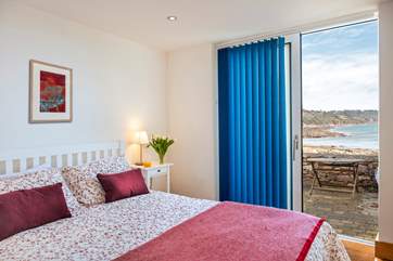 Bedroom 1 is on the lower ground floor with direct access to its own terrace area.