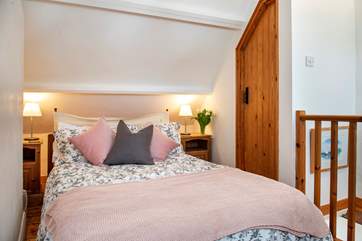 The second bedroom has an en suite cloakroom with a hand-basin and WC. Please note there is limited access to one side of the bed.