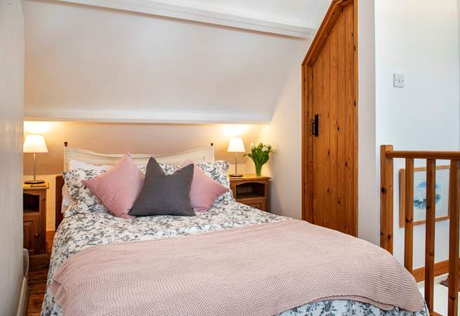 The second bedroom has an en suite cloakroom with a hand-basin and WC. Please note there is limited access to one side of the bed.