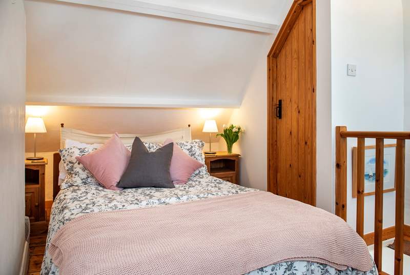 The second bedroom has an en suite cloakroom with a hand-basin and WC. Please note there is limited access to one side of the bed.