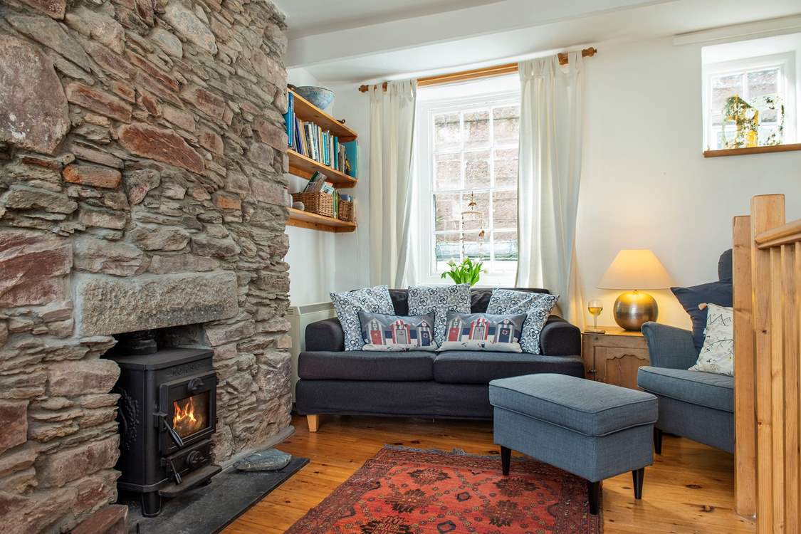The cosy sitting-area with its toasty wood-burner makes this a great retreat all year long.