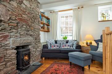 The cosy sitting-area with its toasty wood-burning makes this a great retreat all year long.