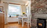 The dining-area takes pride of place soaking in that view. - Thumbnail Image