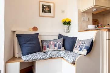 A lovely corner in the kitchen to have your morning coffee.