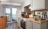 The cottage kitchen is on the ground floor with direct access to the upper terrace area. - Thumbnail Image