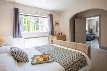 The luxurious king-size bed.