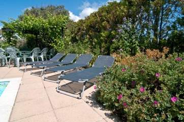 Feel as if you are abroad while soaking up the sun and watching the younger ones enjoy the use of the pool.