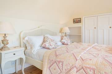 The elegant master bedroom on the first floor...
