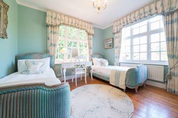 The charming ground floor twin bedroom with en suite shower-room.