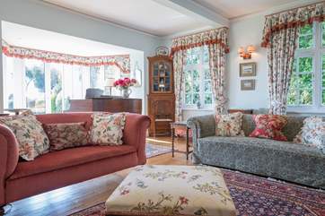 Straight from the comfort of the sitting-room, you can walk outside into the garden through the French doors.