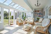 The conservatory is a real sun-trap and ideal for relaxing with views and access to the garden.