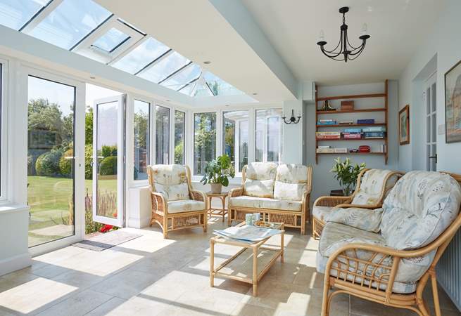 The conservatory is a real sun-trap and ideal for relaxing with views and access to the garden.