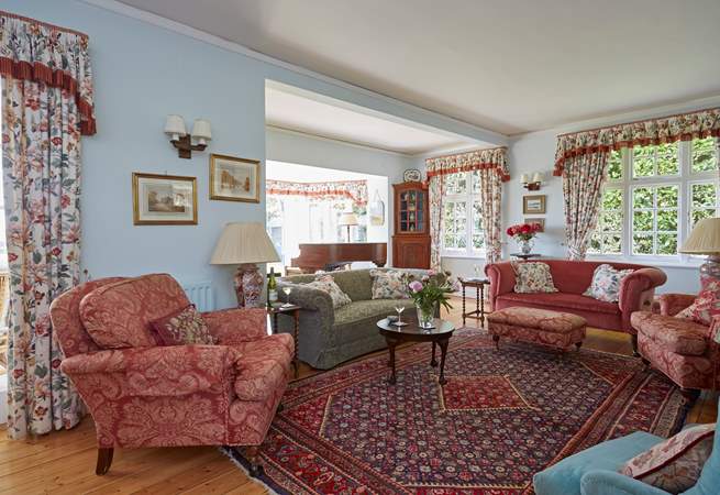 The grand sitting-room is spacious and perfect for all the family to gather after a day out exploring. 