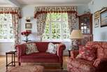 Straight from the comfort of the sitting-room, you can walk outside into the garden through the French doors.