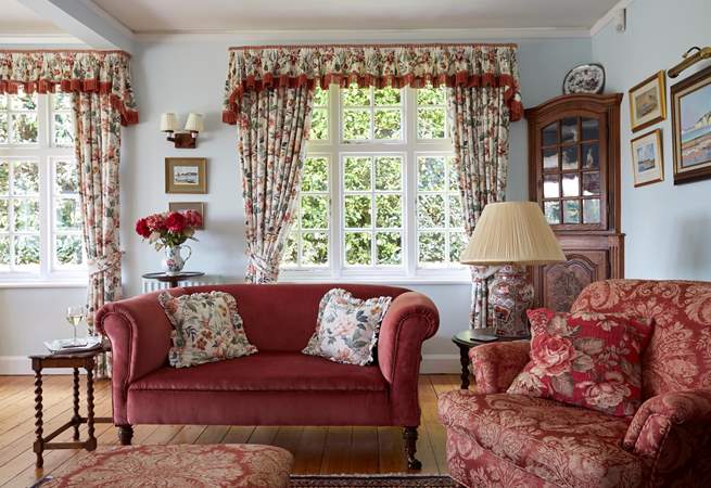 Straight from the comfort of the sitting-room, you can walk outside into the garden through the French doors.