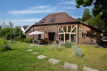 A stylish converted barn in a peaceful location.
