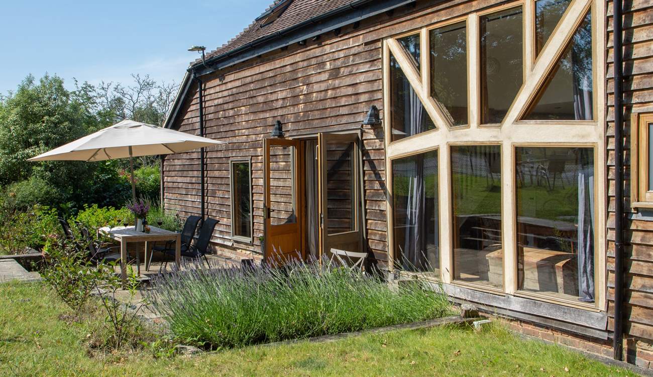 The outside seating area is a lovely spot for a barbecue.