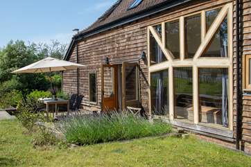 The outside seating area is a lovely spot for a barbecue.