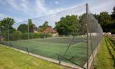 Shared tennis court. - Thumbnail Image