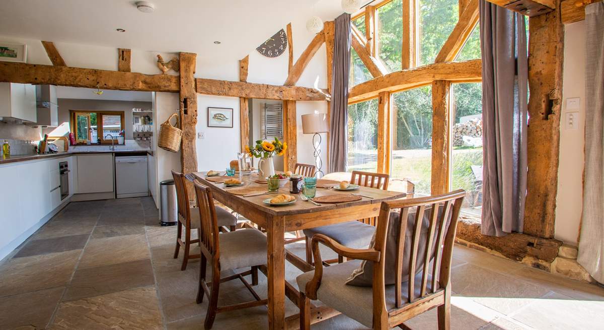 The floor to ceiling windows allow natural light to flood in.