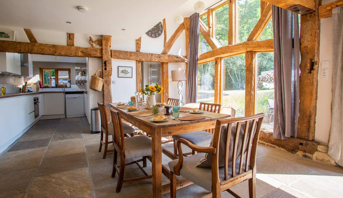 The floor to ceiling windows allow natural light to flood in.