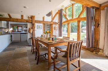 The floor to ceiling windows allow natural light to flood in.