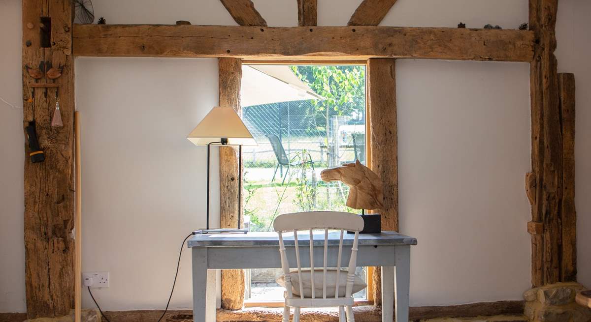 Writing desk with views to the garden and tennis court.