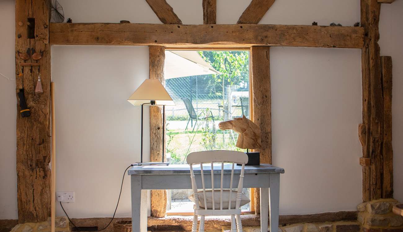 Writing desk with views to the garden and tennis court.
