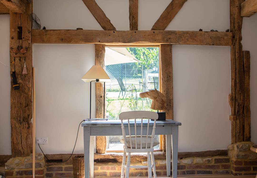 Writing desk with views to the garden and tennis court.