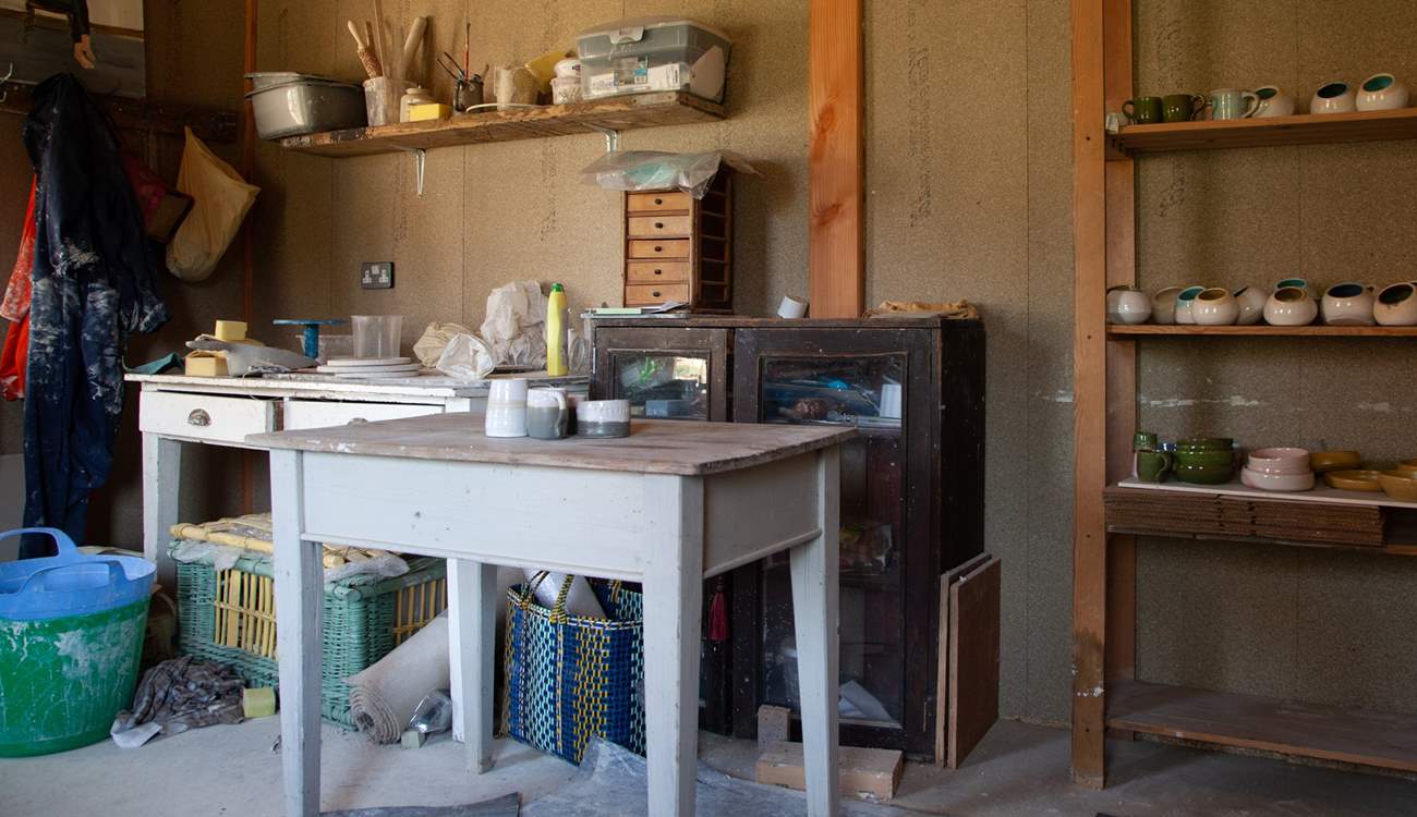 Book a pottery lesson in advance with the owner.